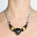 Les bijoux Jacaranda en graines naturelles : Collier modÃ¨le PALMIER A HUILE LEOPARD  1